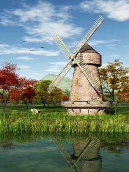 This image shows a windmill in fall