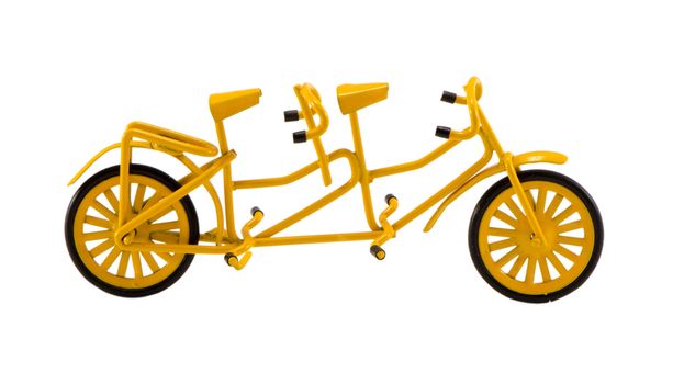 double yellow color bicicle model toy isolated on white background.