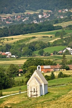 Stone church in green nature of Kalnik mountain, Croatia