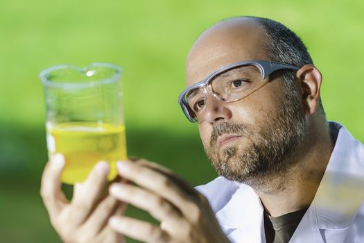 Scientific chemistry laboratory investigated in a liquid measuring cup