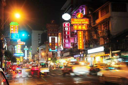 Bangkok, Thailand - March 03, 2013: Busy Yaowarat Road in the evening in Bangkok. Yaowarat Road is a main street in Bangkok's Chinatown,  was opened in 1891 in the reign of King Rama V.
