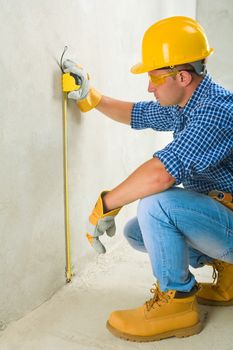 worker with tape measure