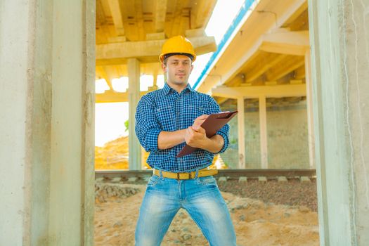 young worker holding clipboard