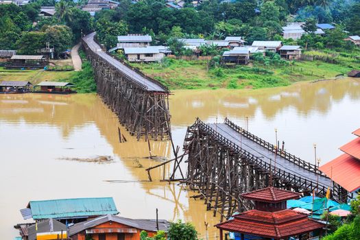 Famous wooden mon bridge in kanchanaburi collapsed during the flash floods