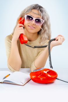 a young blonde with telephone