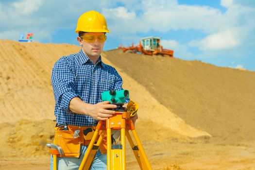 contractor with theodolite