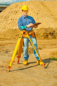 contractor writing in clipboard