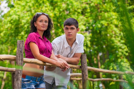 couple on nature oking at camera