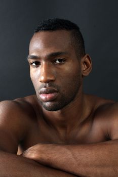 A handsome black man, headshot.