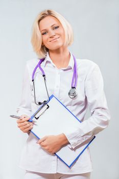 female doctor with a clipboard