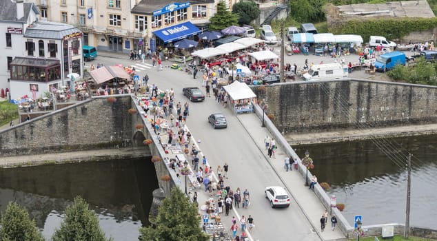 view on the belgium city bouillon with the market and boats on the river