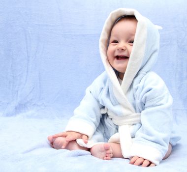 beautiful happy baby after bath look at the camera