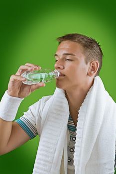 a young guy drinking water
