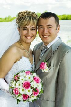 bride and groom on a nature