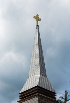 This Celtic Cross is lifted high to the heavens on a tall church steeple. The ring in the cross respresents eternity.