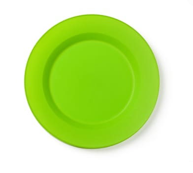 Disposable green plate isolated on a white background.