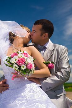 wedding couple kisses