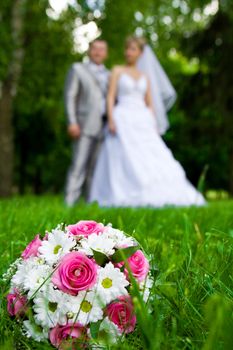 weding bouquet on a grass