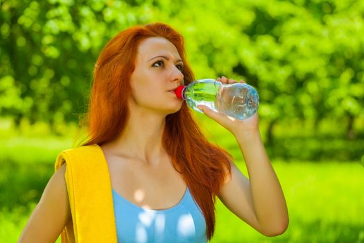 a female drinking water