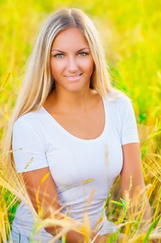 a nice blonde wearing  white clothes