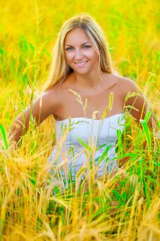 a smiling blonde  on good summer day