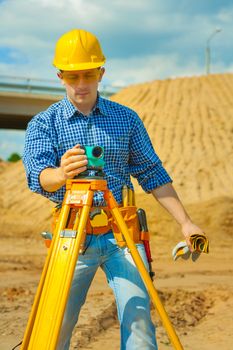 a worker with theodolite