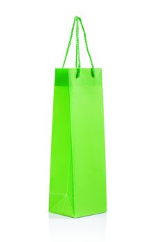 a single green paper bag isolated