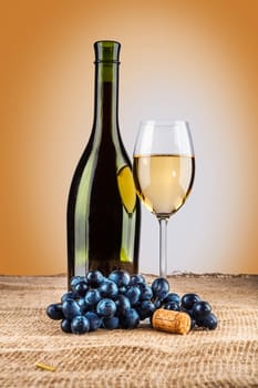 bottle and glass and grape