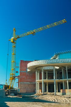 crane in work of construction of a building
