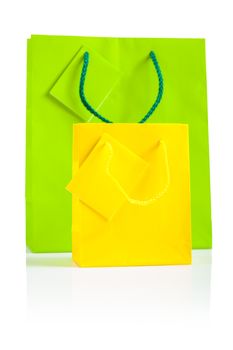 yellow and green paper bags isolated