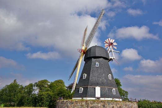 Traditional old Danish windmill in the countryside Funen Denmark