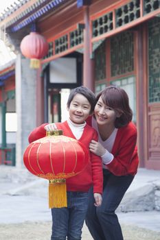 Mother And Son Holding Chinese Lantern