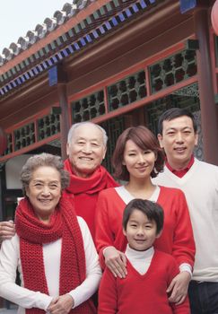 Multi-generation Family portrait by traditional Chinese building