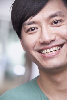 Close up portrait of young man smiling, Beijing