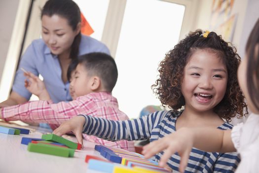 Children Playing in a Classroom