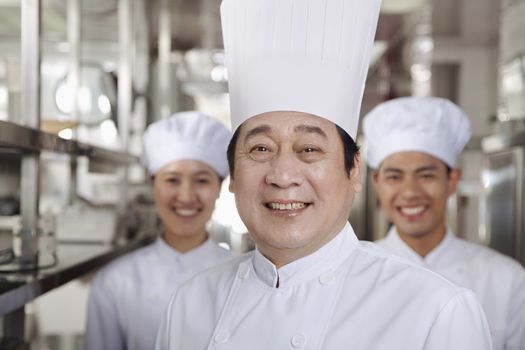 Portrait of a Chef in an Industrial Kitchen