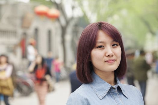 Young Woman smiling and looking at camera