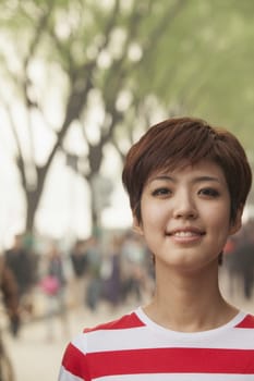 Young Woman smiling and looking at camera