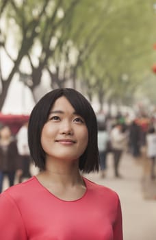 Young Woman smiling and looking away