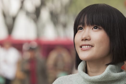 Young Woman smiling and looking away