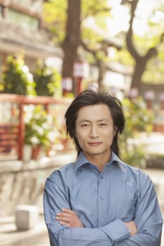 Young Man smiling and looking at camera