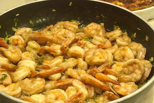 Shrimps cooked with ginger and garlic, steamed with white wine