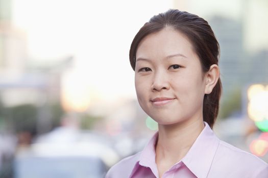 Young Businesswoman outside in Beijing, portrait