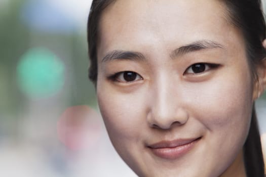 Close-up portrait of young woman