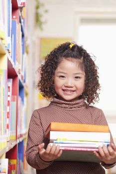 Little Girl Carrying Books