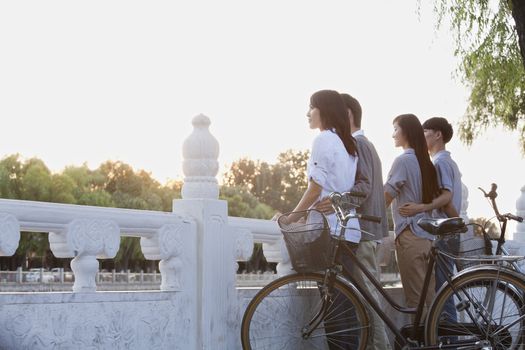 Two couples by HouHai Lake with Bicycles in Beijing