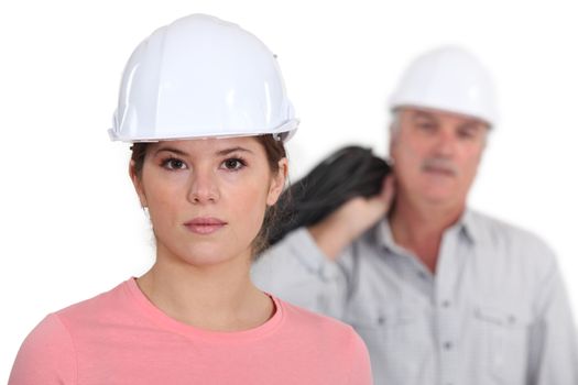 Builder with young female student