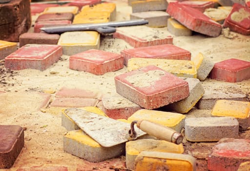 Stone blocks laying down on sand