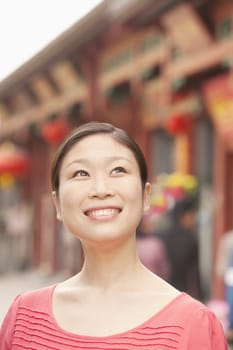 Young Woman smiling and looking away