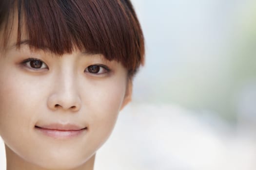 Close-up portrait of young woman smiling in Beijing